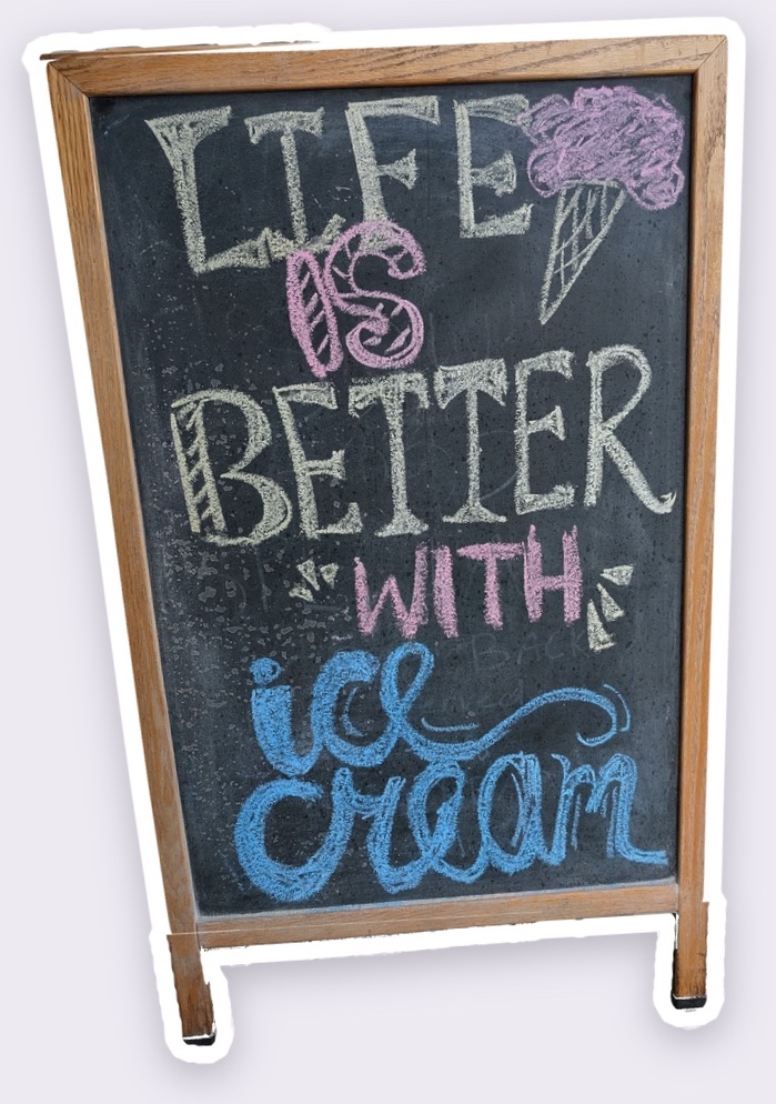 Chalkboard sign reading: Life is better with ice cream